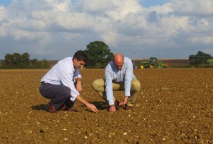 Tom Rivett and Tim Walpole of H Banham grain merchants checking the sowing of the 50th anniversary crop of Maris Otter barley in October 2014