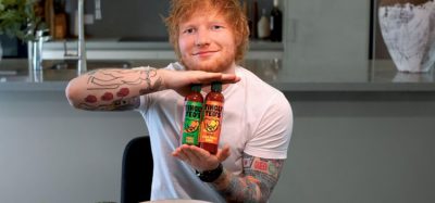 Ed Sheeran holding Tingly Ted's sauce