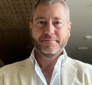 A headshot of Quincy Lissaur, Executive Director of SSAFE