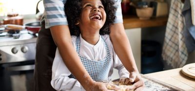 Child and mother with baking kit