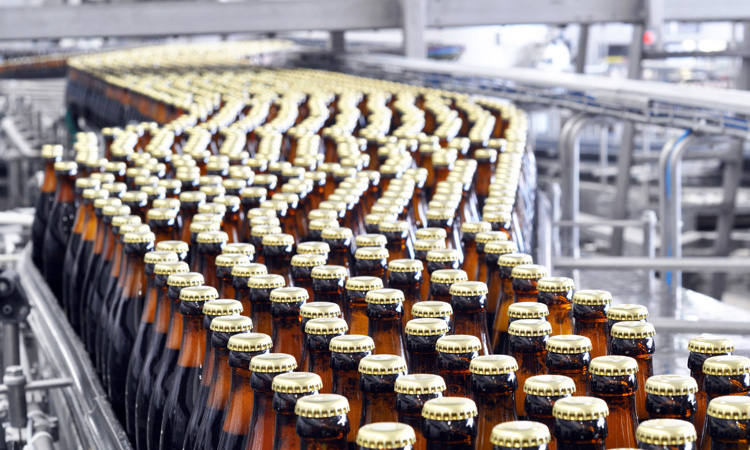 How has COVID-19 impacted the UK brewing and distilling industries?