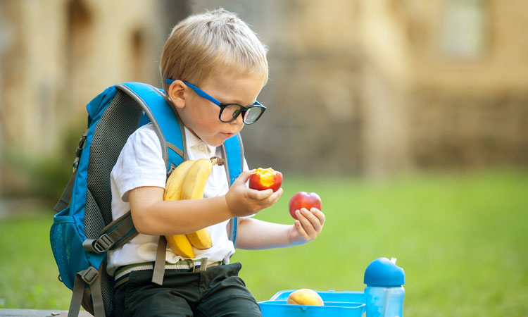 Child choosing fruit