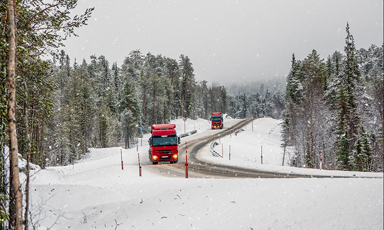 a truck travelling on an icy road in Russia 