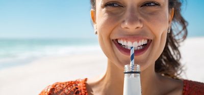 woman drinking low sugar drink