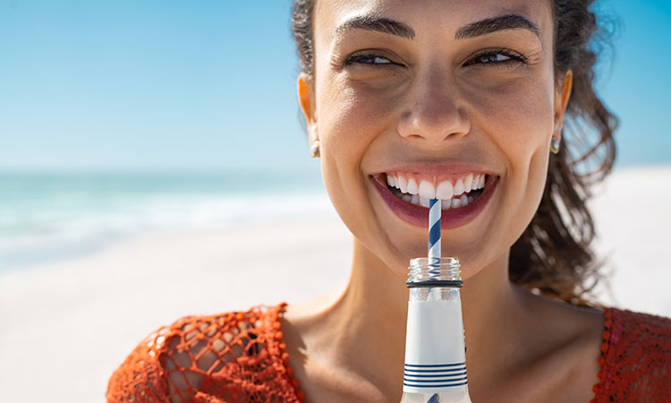 woman drinking low sugar drink