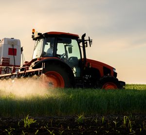 pesticides sprayed onto green fields