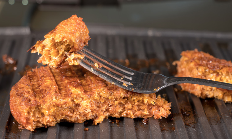 plant-based burger on grill