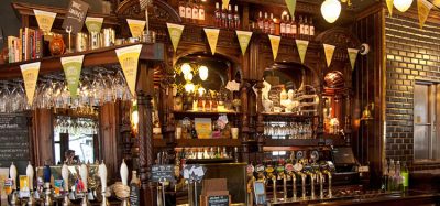 LONDON, UNITED KINGDOM - 26 APRIL, 2015: Typical British pub in London, United Kingdom on 26 April, 2015.