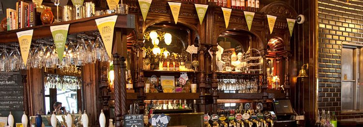 LONDON, UNITED KINGDOM - 26 APRIL, 2015: Typical British pub in London, United Kingdom on 26 April, 2015.