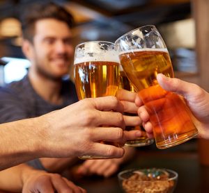 friends sharing a pint at the pub