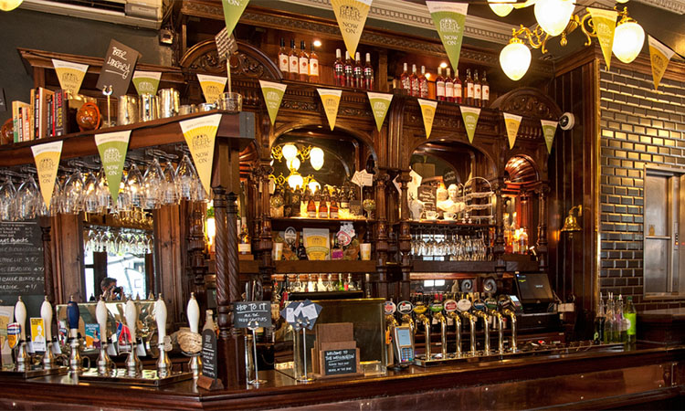 LONDON, UNITED KINGDOM - 26 APRIL, 2015: Typical British pub in London, United Kingdom on 26 April, 2015.