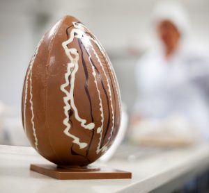 Chocolate Easter egg in factory