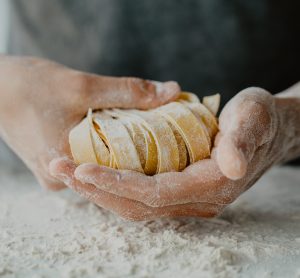 man making fresh pasta