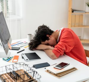 student asleep on desk