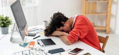 student asleep on desk