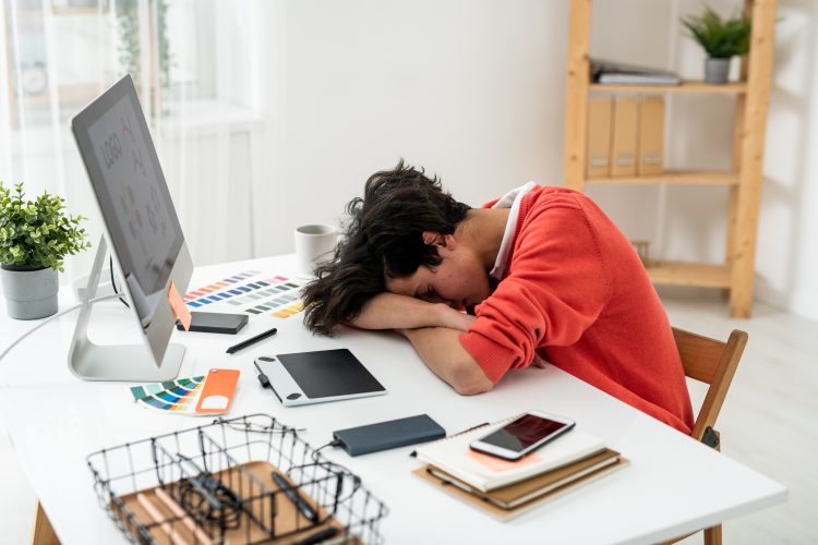 student asleep on desk