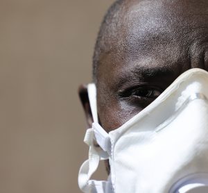 black man wearing mask