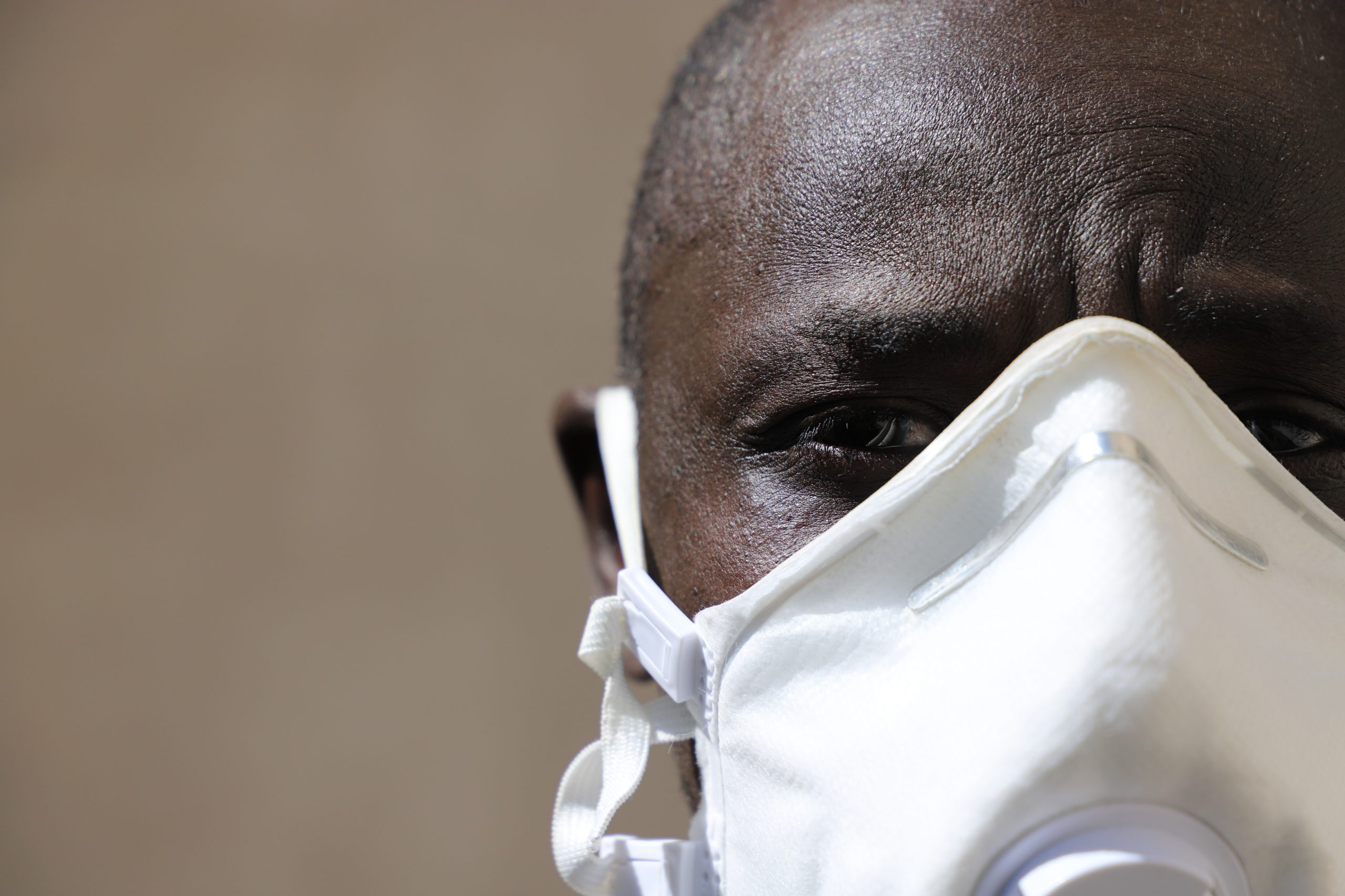 black man wearing mask