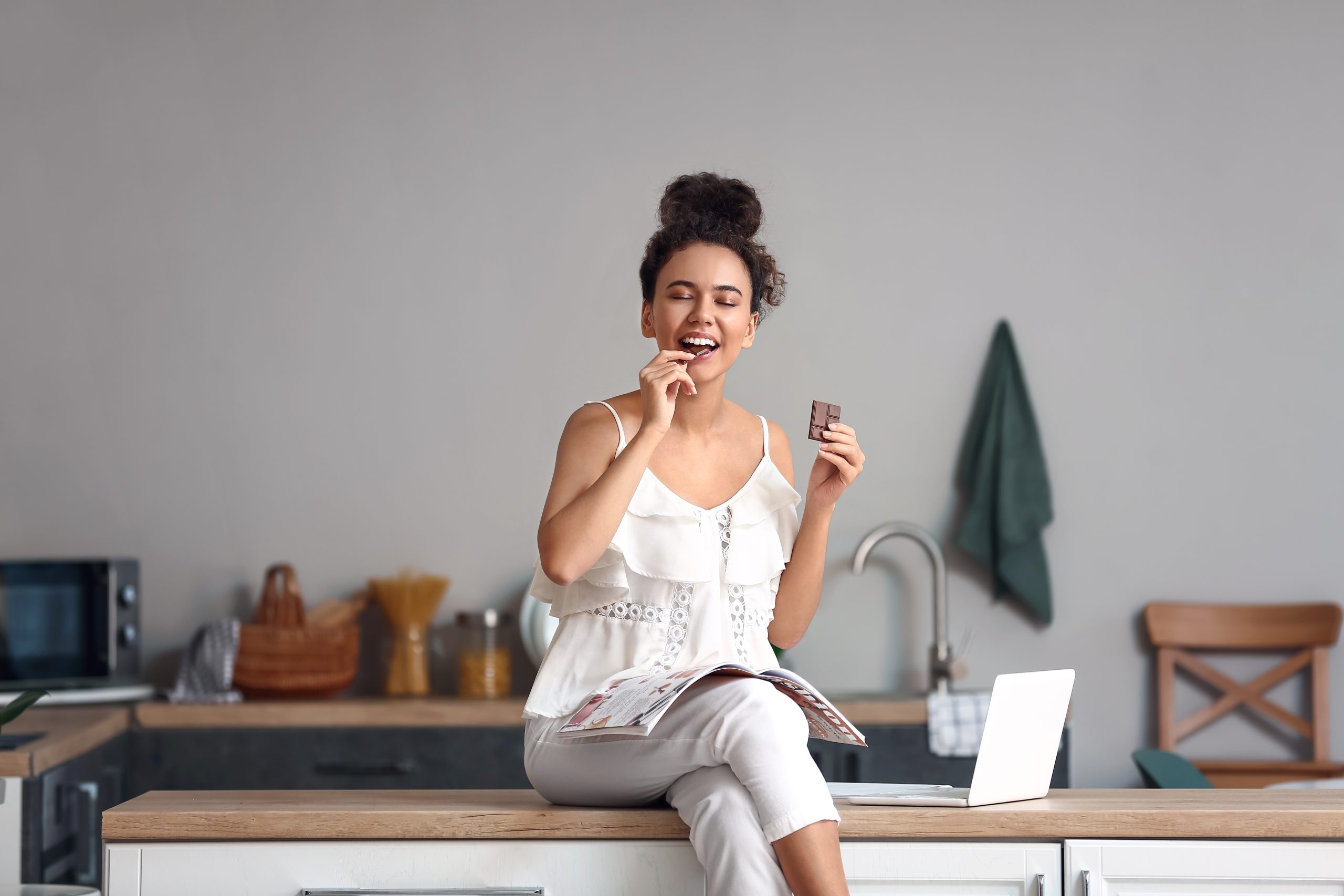 woman eating chocolate