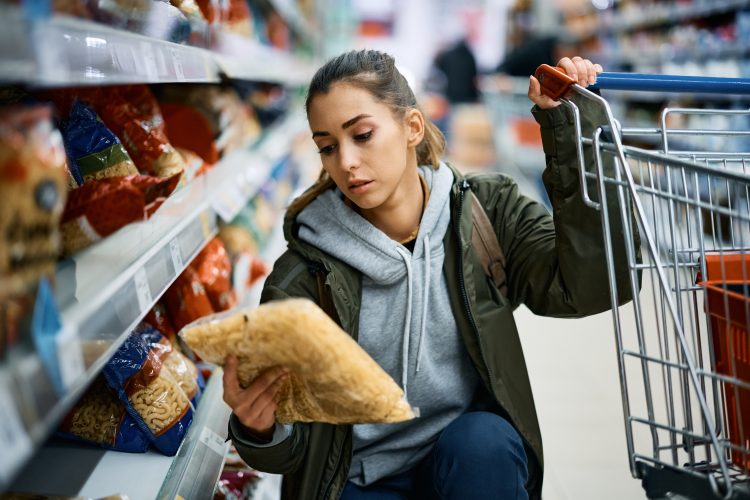 woman looking at pasta