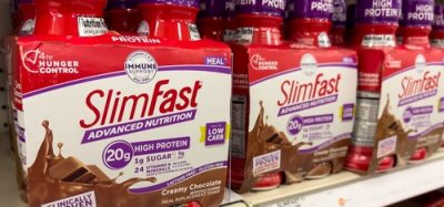 SlimFast products displayed on shelves, now sold by Glanbia to Heartland Food Products Group.