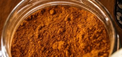 Bowl of ground cinnamon, representing brands affected by the FDA cinnamon recall 2025 due to lead contamination.