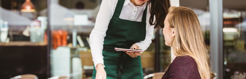 waitress helping customer