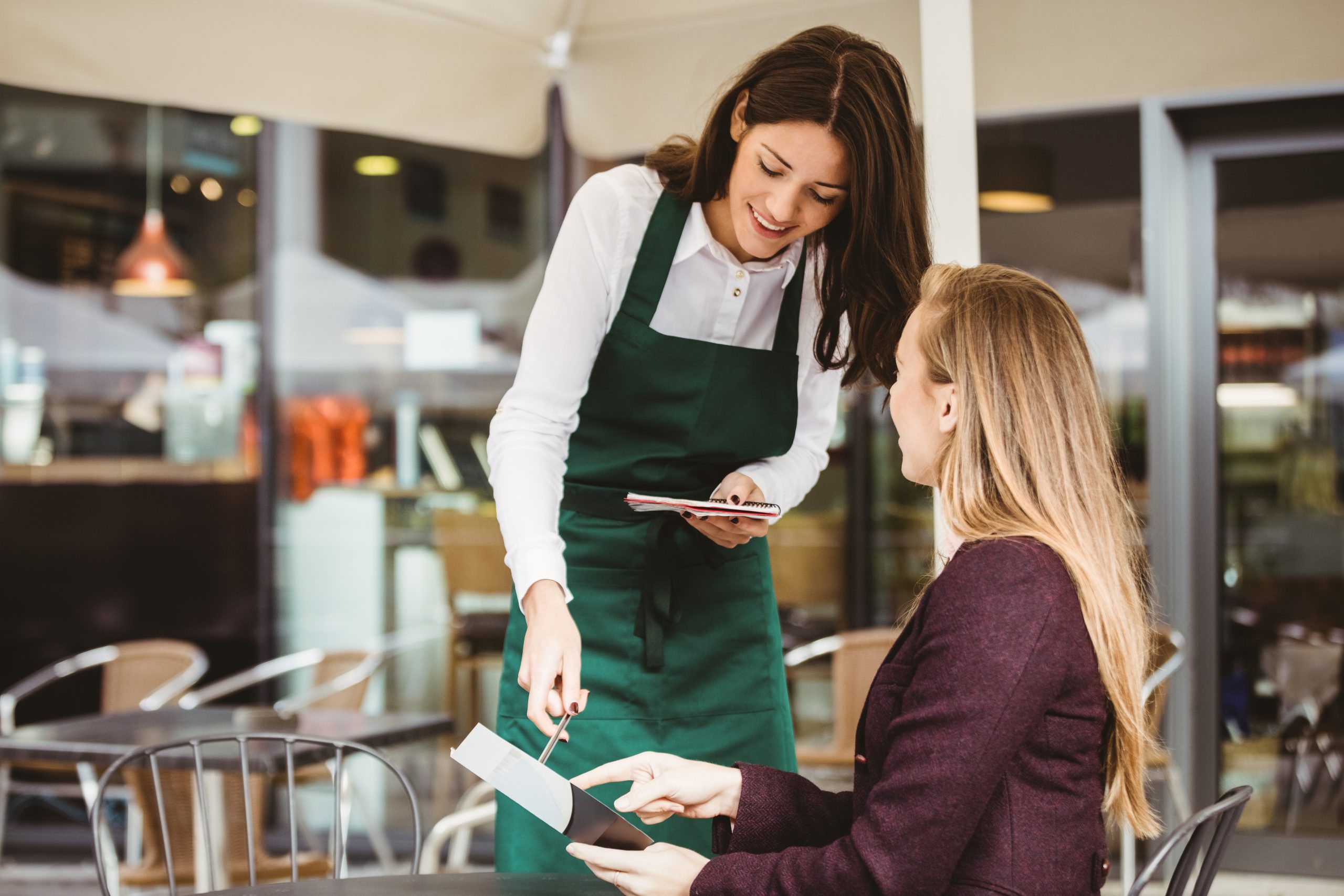 waitress helping customer