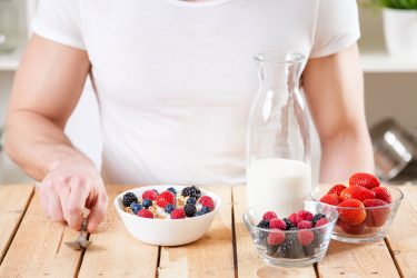 man eating yogurt 