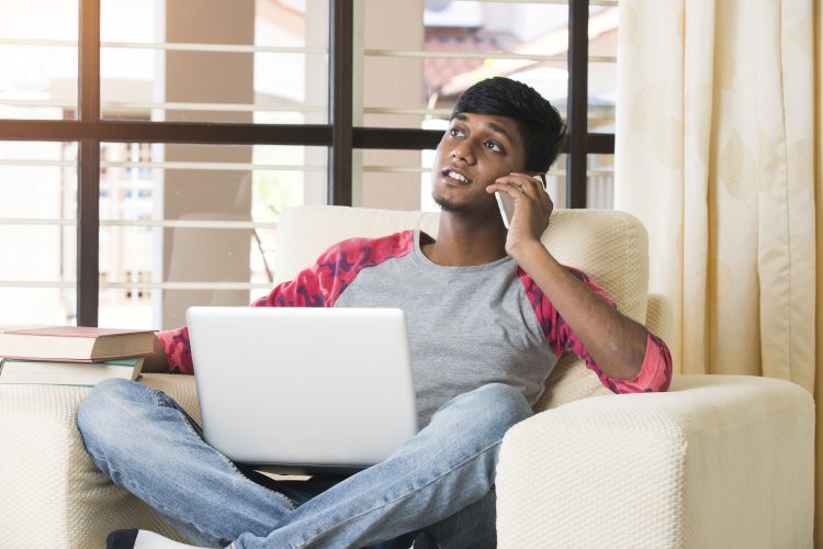 young man on phone