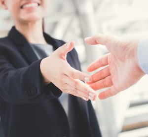 woman hand shaking