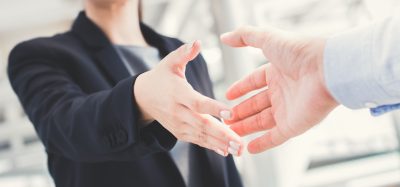 woman hand shaking