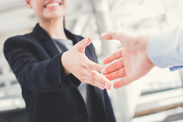 woman hand shaking