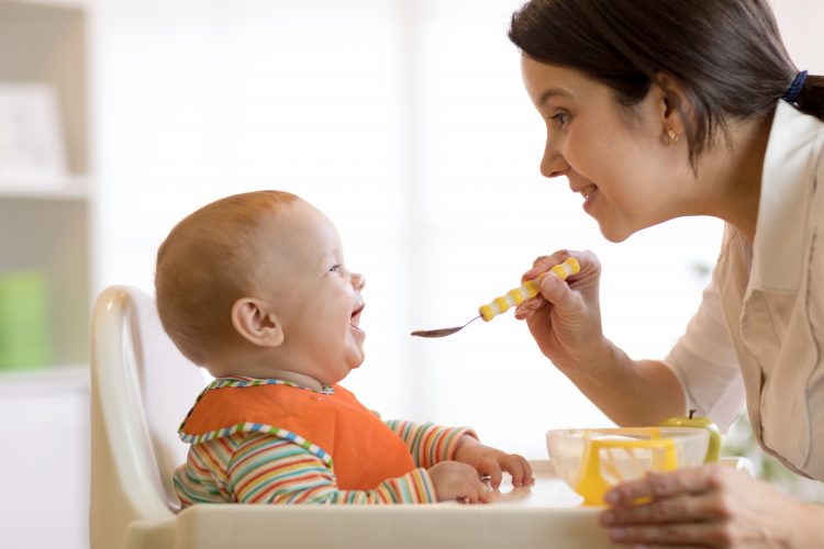 Mum feeding baby