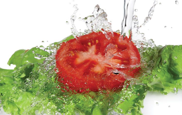 Washing a tomato