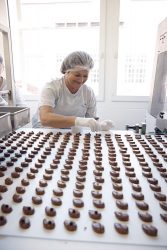 Worker on chocolate production line